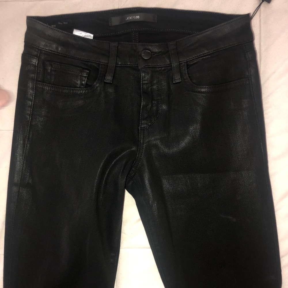Black shiny ultra skinny Joes jeans.